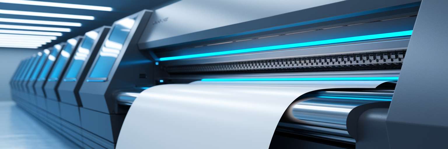 Modern printing press producing continuous paper.